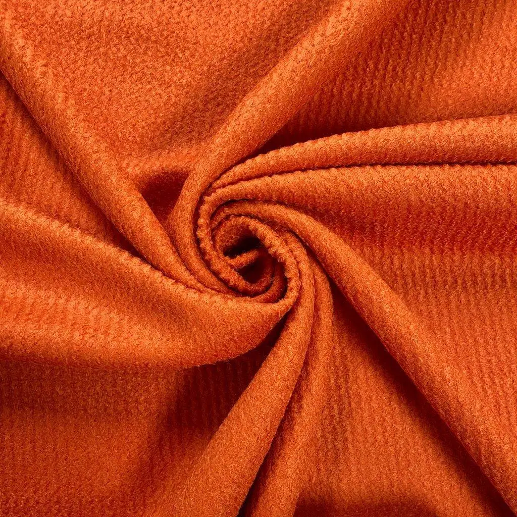 How is custom clothing manufacturing costed?